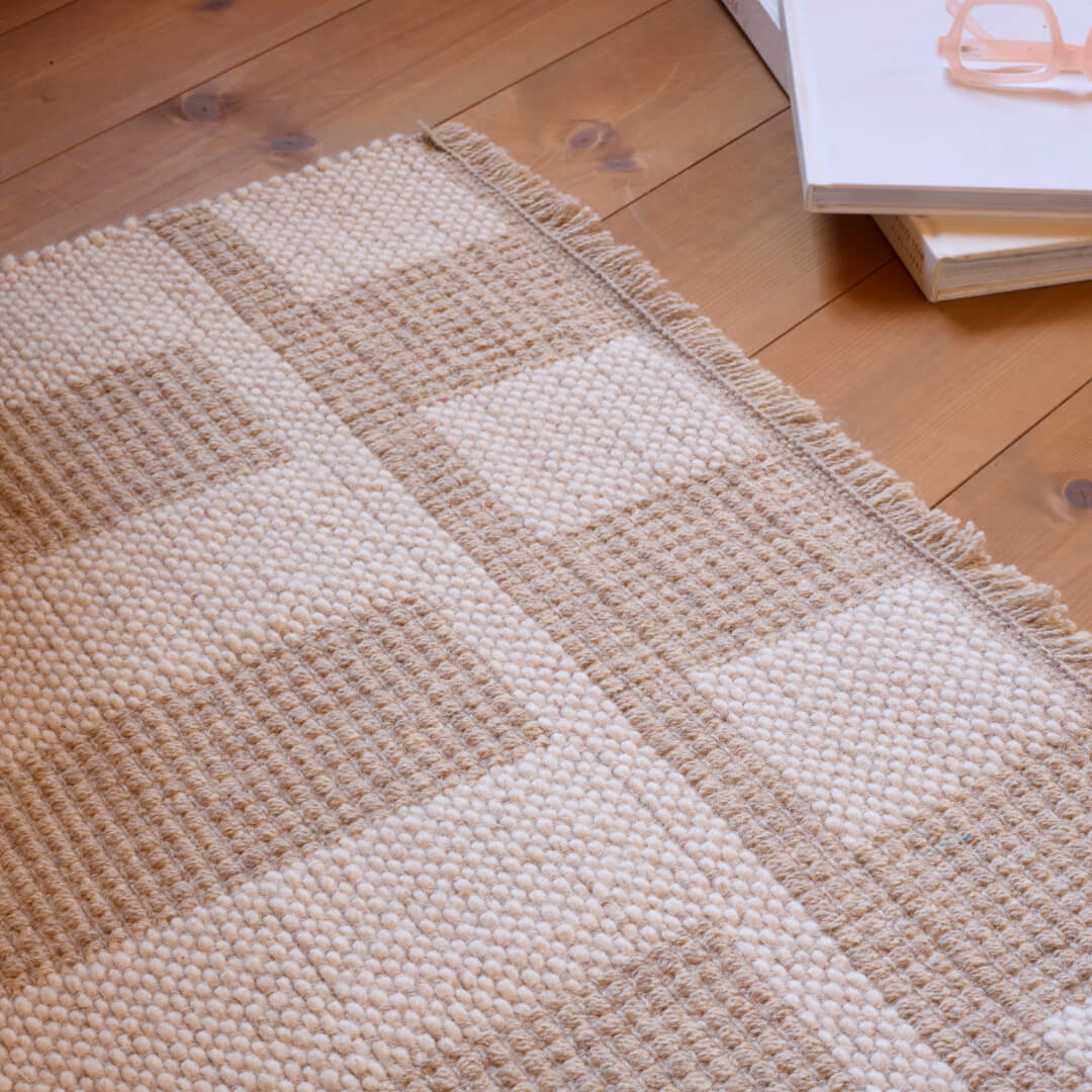 Alden beige/hvit teppe