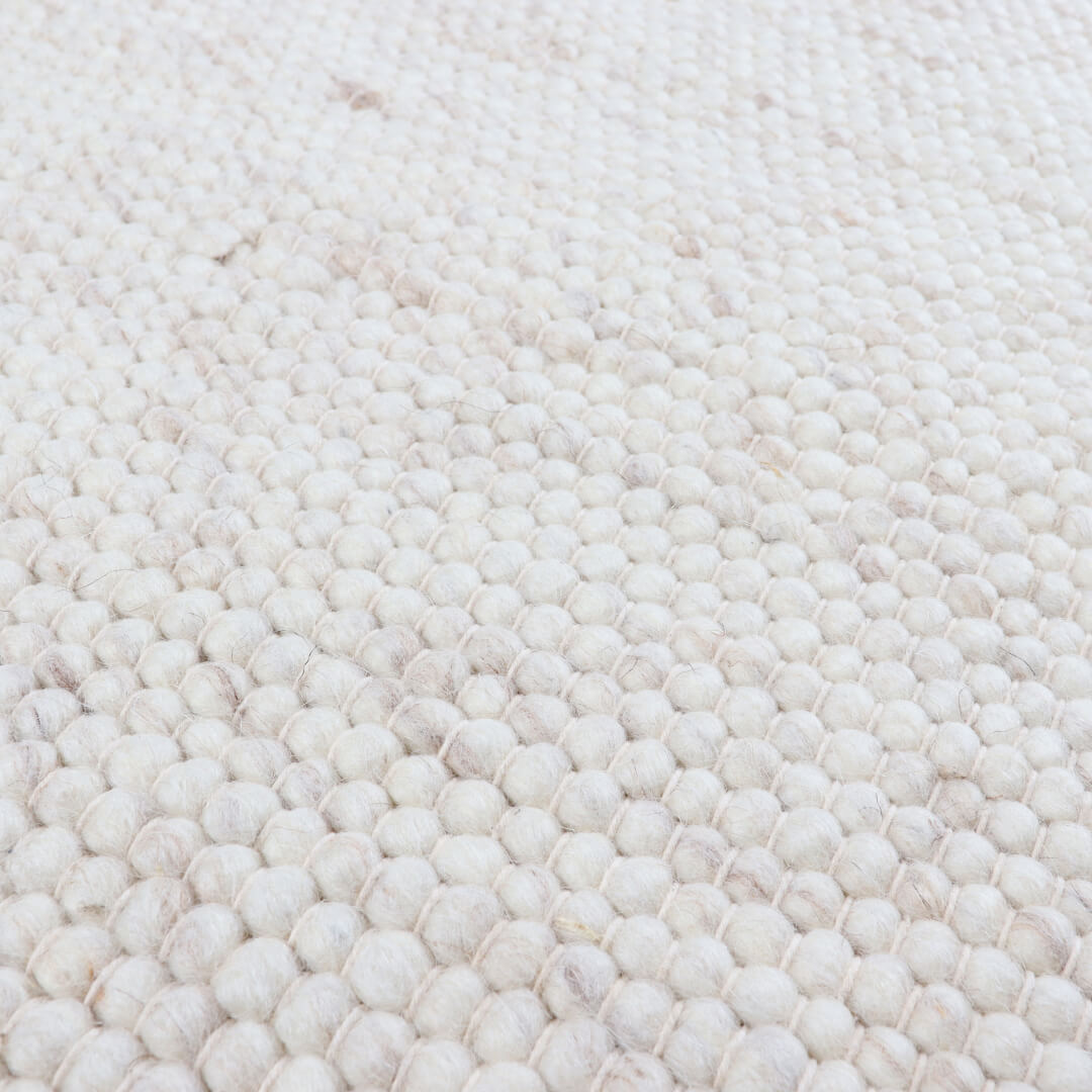 Hondo hvit rundt teppe