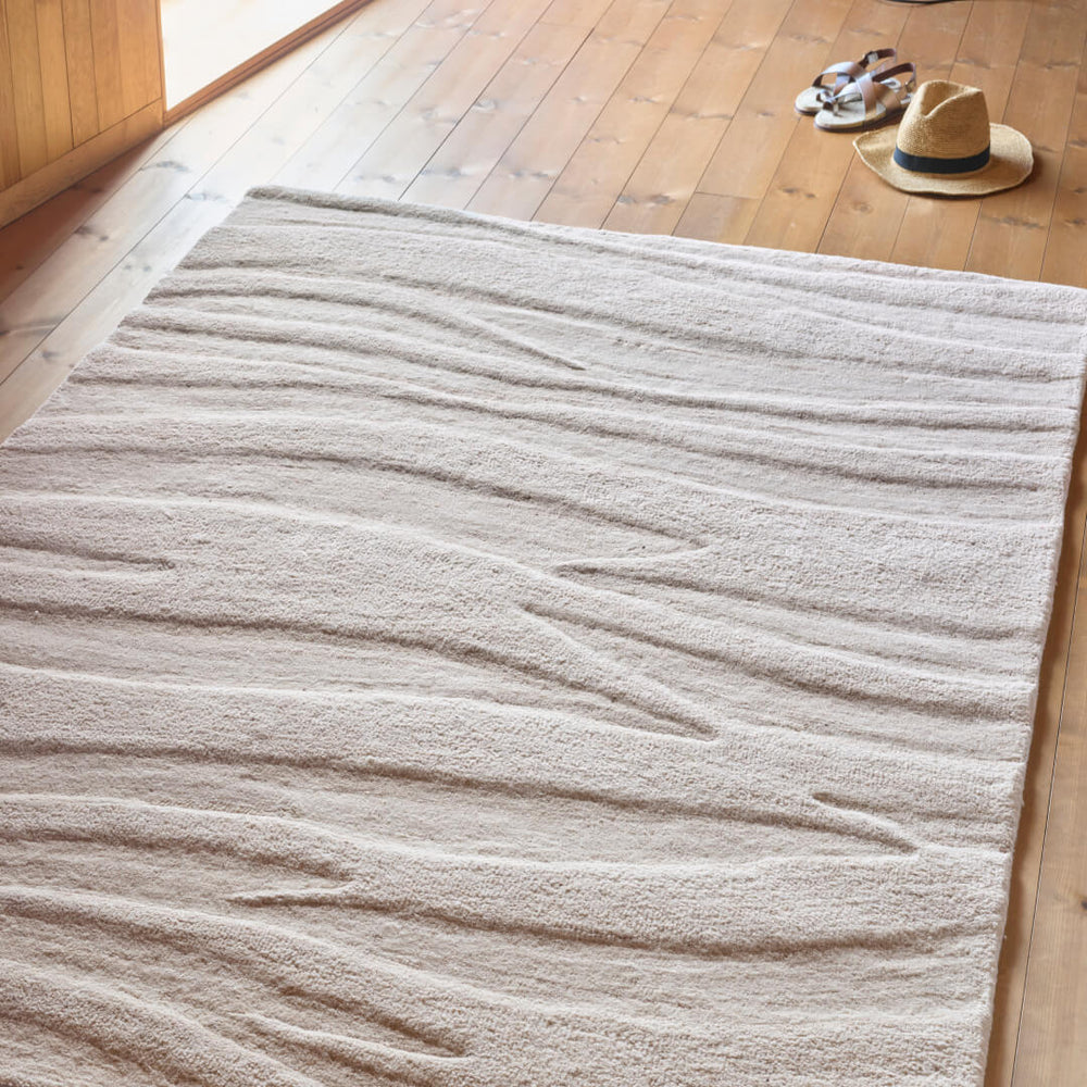 
                      
                        Surin beige teppe
                      
                    