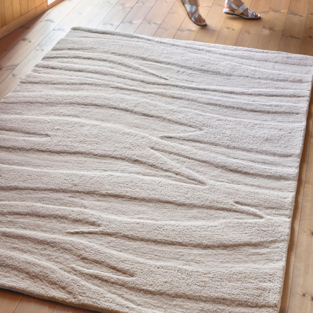 Surin beige teppe